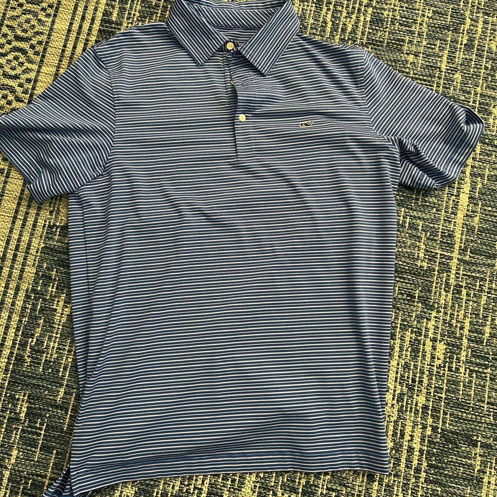 Like new vineyard vines golf shirt. Blue with white stripe. Size M